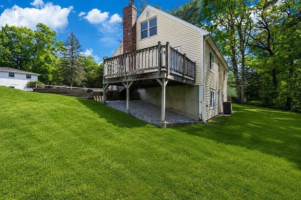 117 Oak Ridge Drive Ayer, MA 01432 - Photo 21 of 26 a view of house with backyard