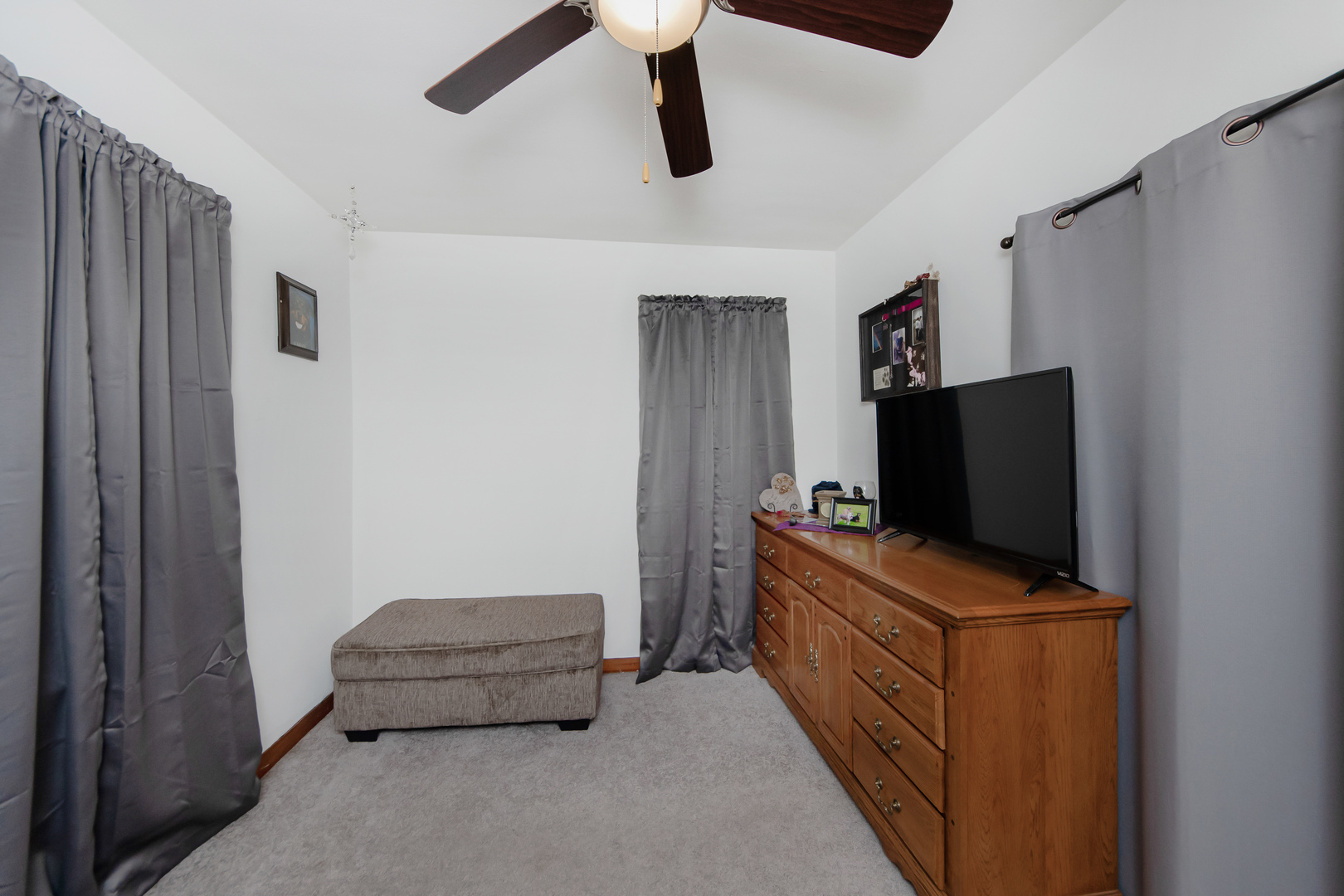 301 West Broad Street Rutland, IL 61358 - Photo 17 of 39 a room with furniture and flat screen tv