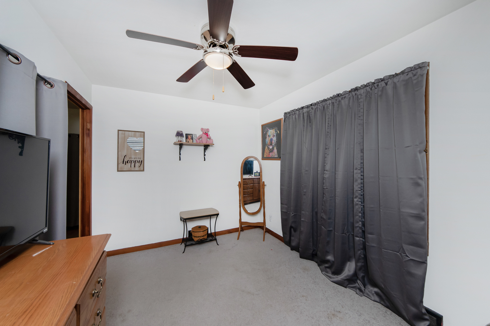 301 West Broad Street Rutland, IL 61358 - Photo 18 of 39 a view of a livingroom with furniture and a ceiling fan