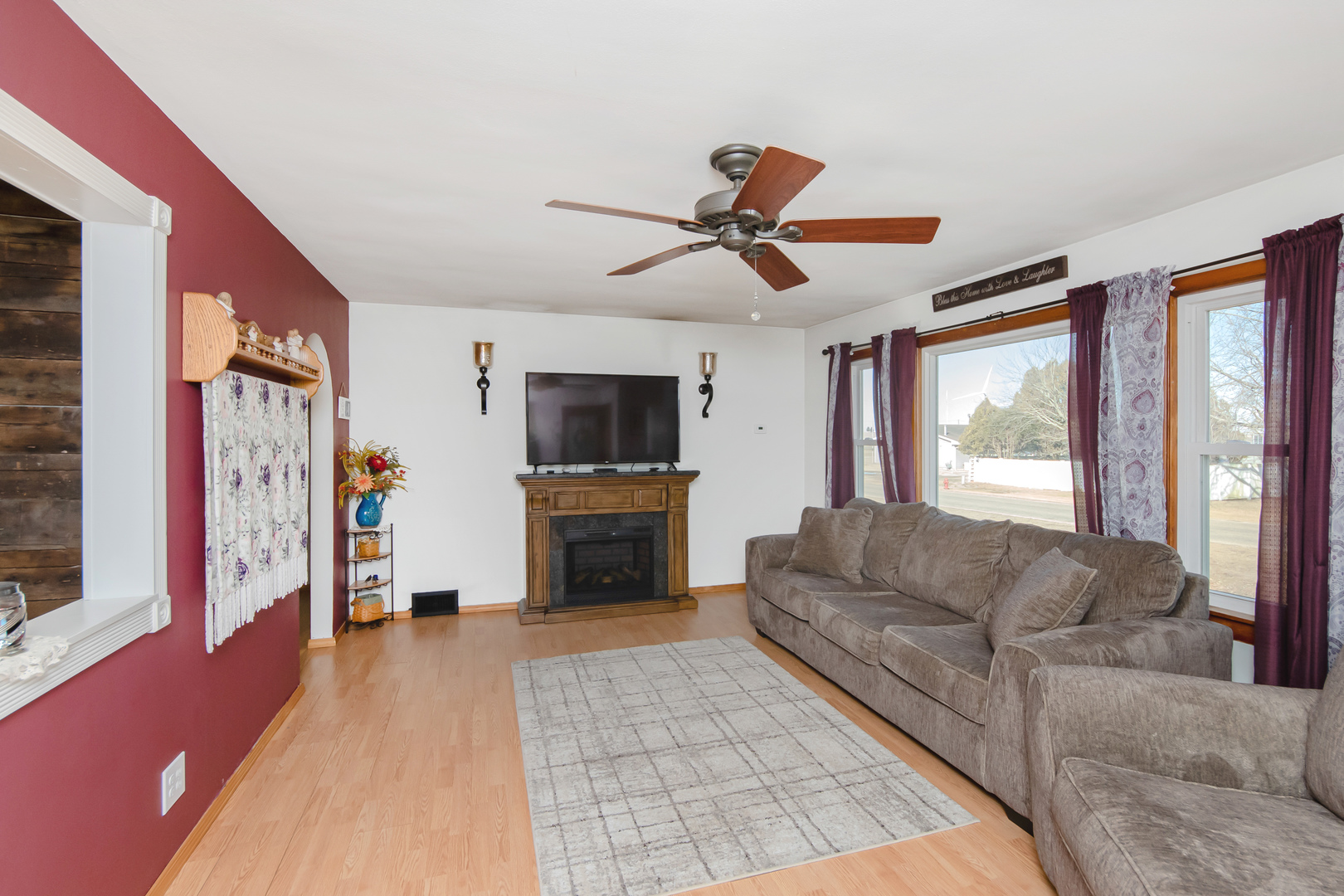 301 West Broad Street Rutland, IL 61358 - Photo 3 of 39 a living room with furniture and a flat screen tv