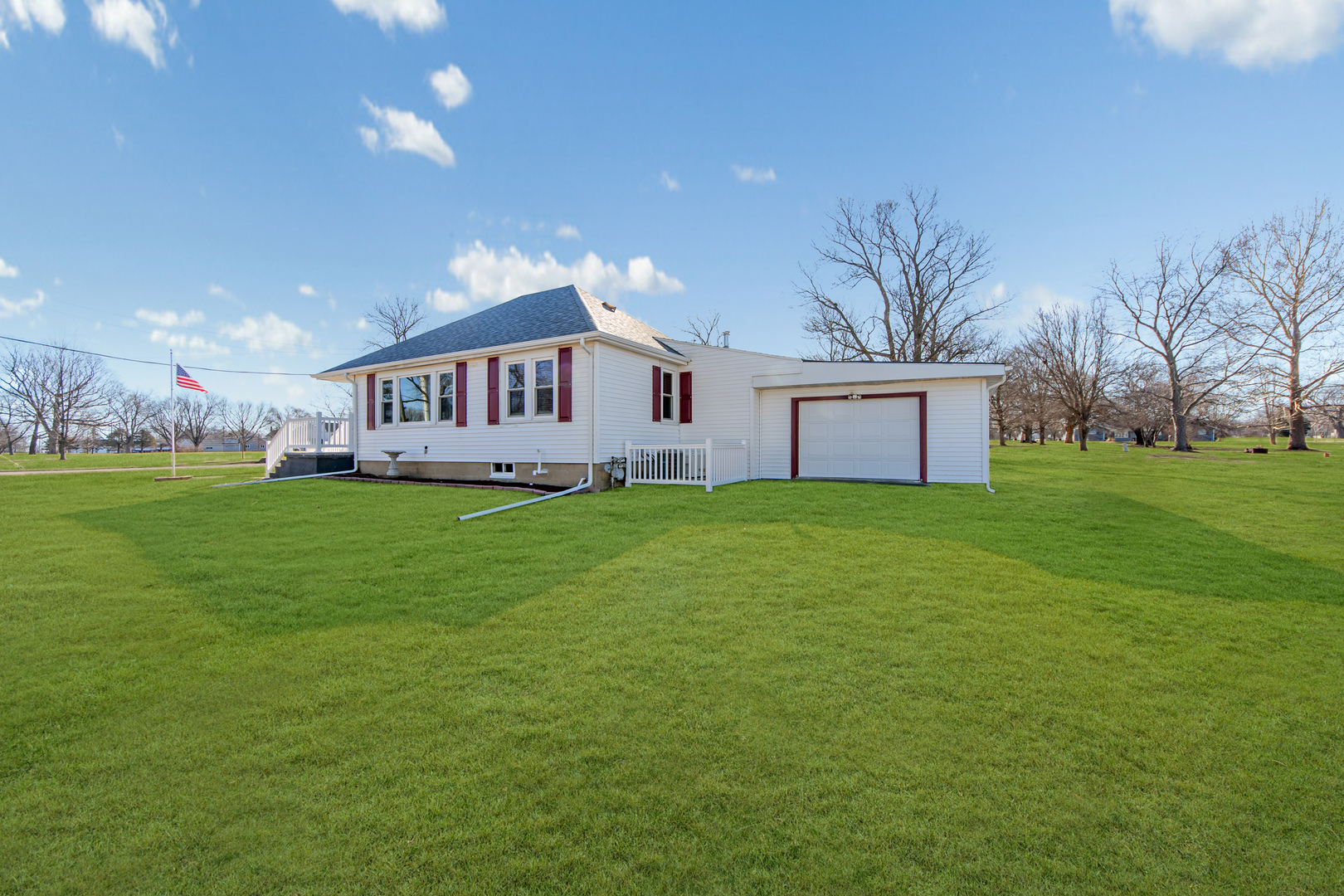 301 West Broad Street Rutland, IL 61358 - Photo 35 of 39 a front view of house with yard and trees