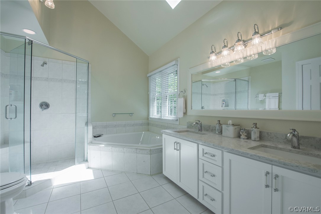 5316 Meadow Chase Road Midlothian, VA 23112 - Photo 23 of 31 a spacious bathroom with a granite countertop sink mirror and shower