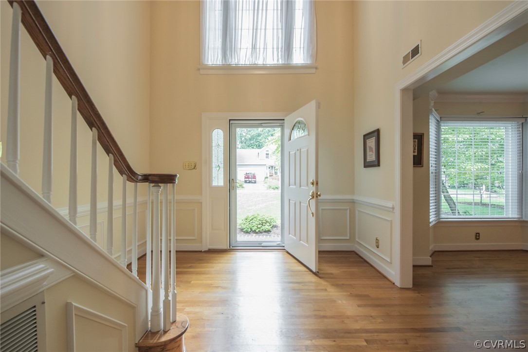 5316 Meadow Chase Road Midlothian, VA 23112 - Photo 3 of 31 a view of an entryway with wooden floor and windows