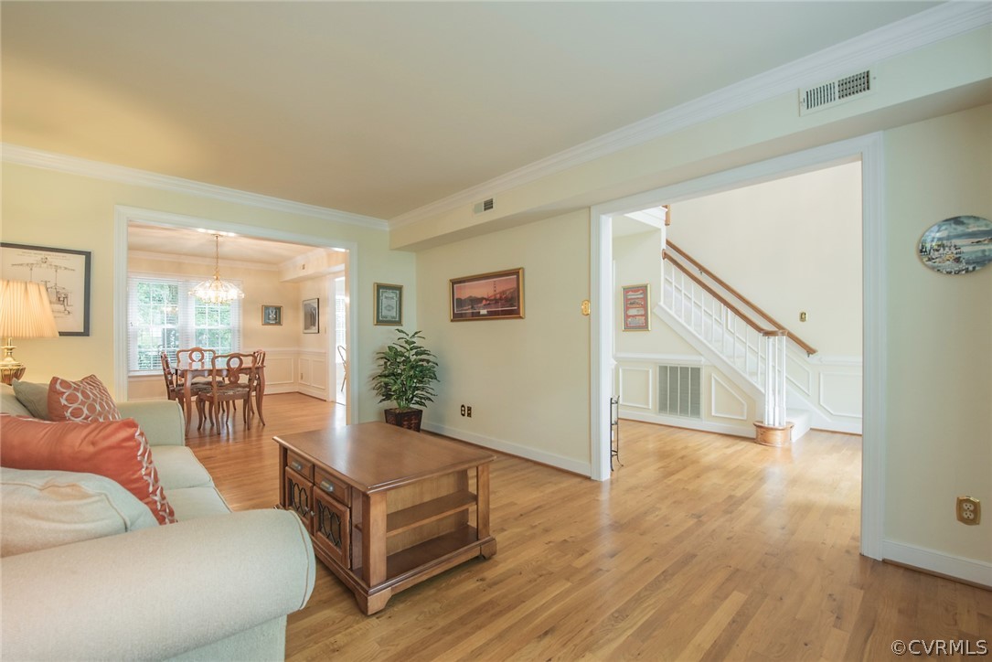 5316 Meadow Chase Road Midlothian, VA 23112 - Photo 6 of 31 a living room with furniture and wooden floor