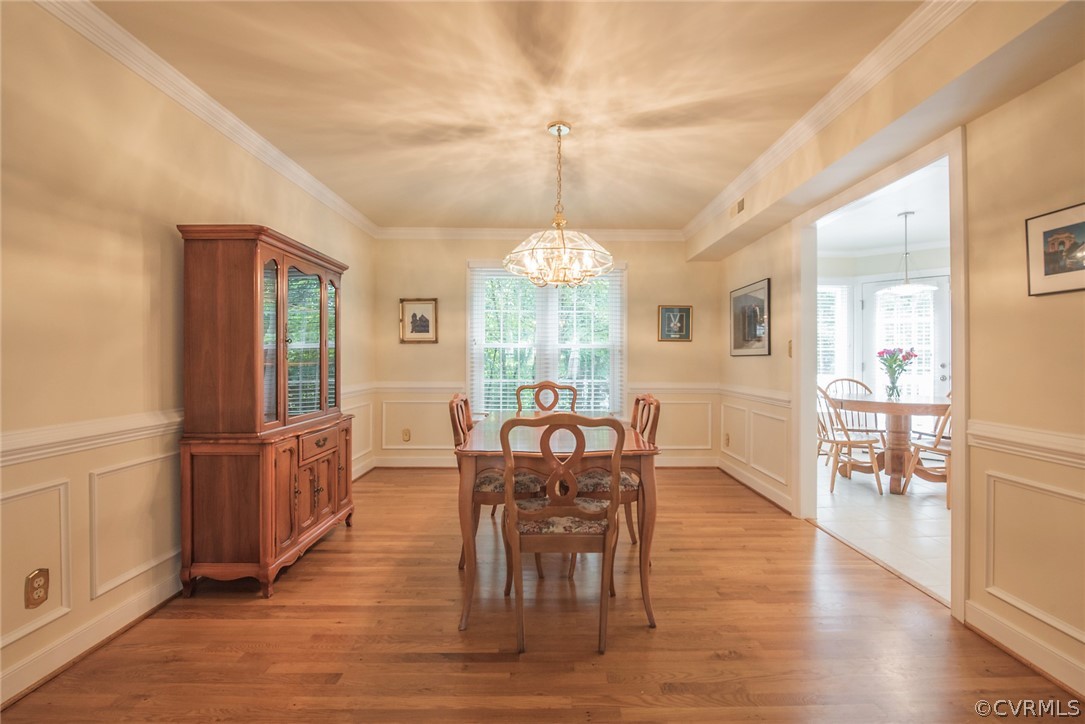 5316 Meadow Chase Road Midlothian, VA 23112 - Photo 7 of 31 a view of a dining room with furniture window and wooden floor
