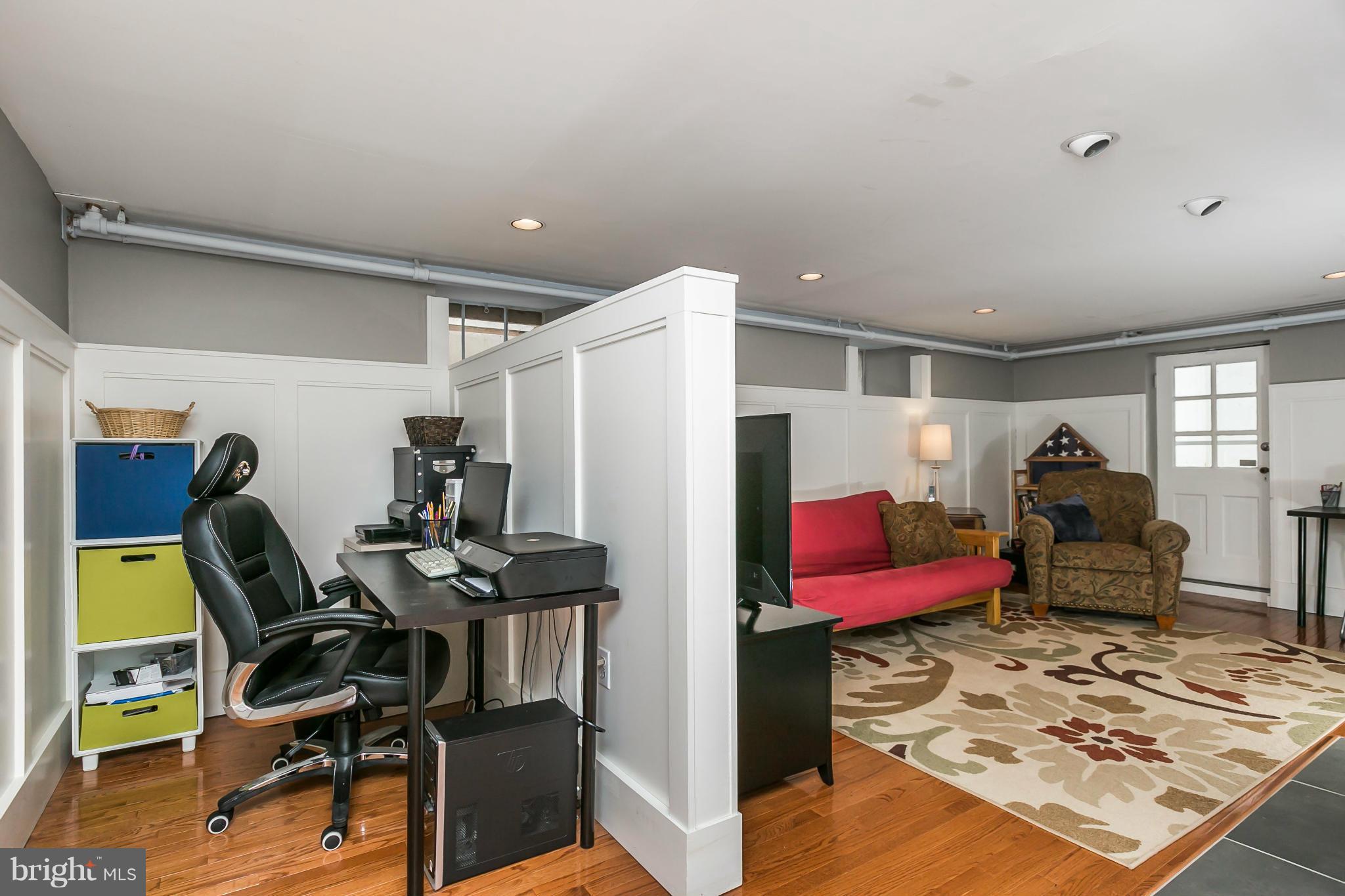 5716 Kenmore Road Baltimore, MD 21210 - Photo 20 of 30 a workspace with furniture and a window