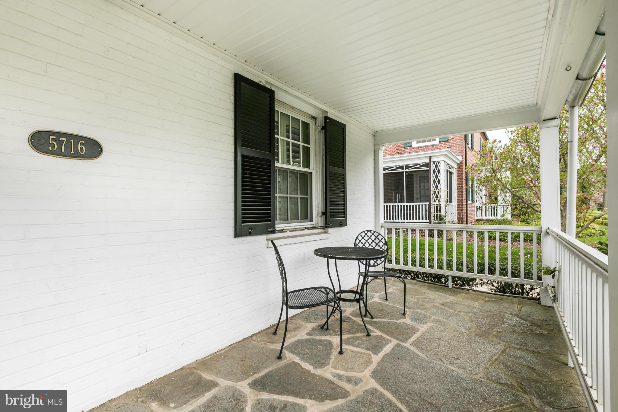 5716 Kenmore Road Baltimore, MD 21210 - Photo 22 of 30 a balcony with furniture and a window