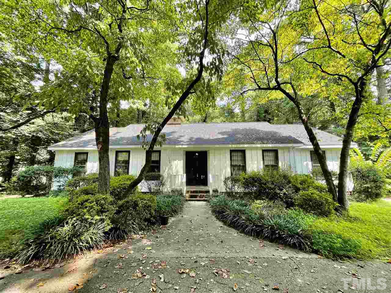 3100 Shadwell Court Raleigh, NC 27613 - Photo 1 of 30 front view of a house with a garden