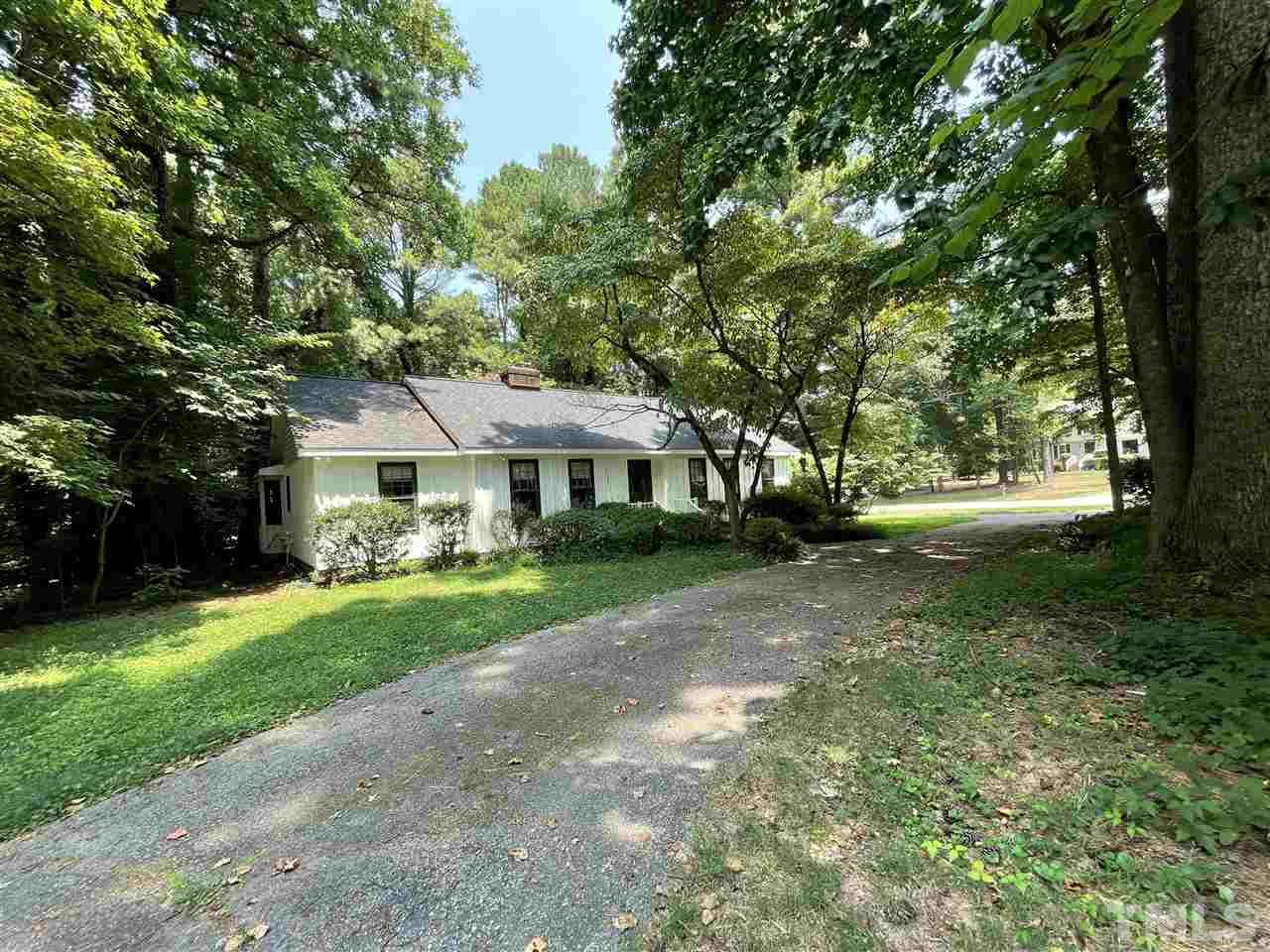 3100 Shadwell Court Raleigh, NC 27613 - Photo 2 of 30 a front view of a house with a yard