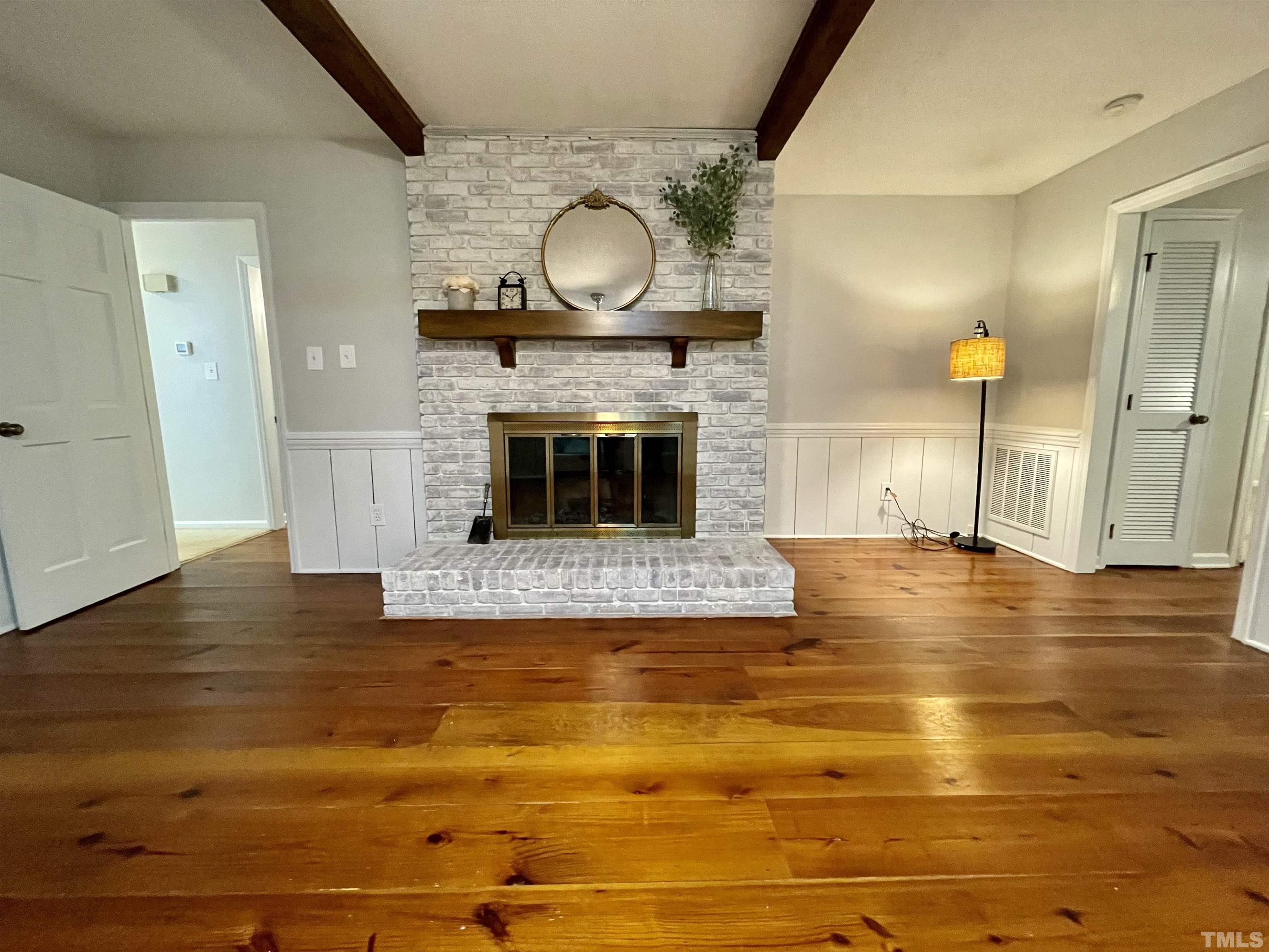 3100 Shadwell Court Raleigh, NC 27613 - Photo 16 of 30 a view of empty room with wooden floor