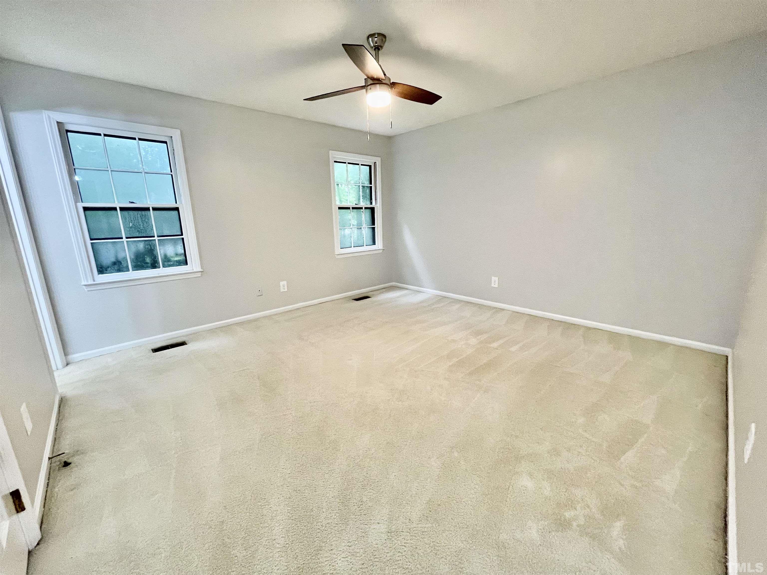 3100 Shadwell Court Raleigh, NC 27613 - Photo 20 of 30 a view of an empty room with a window