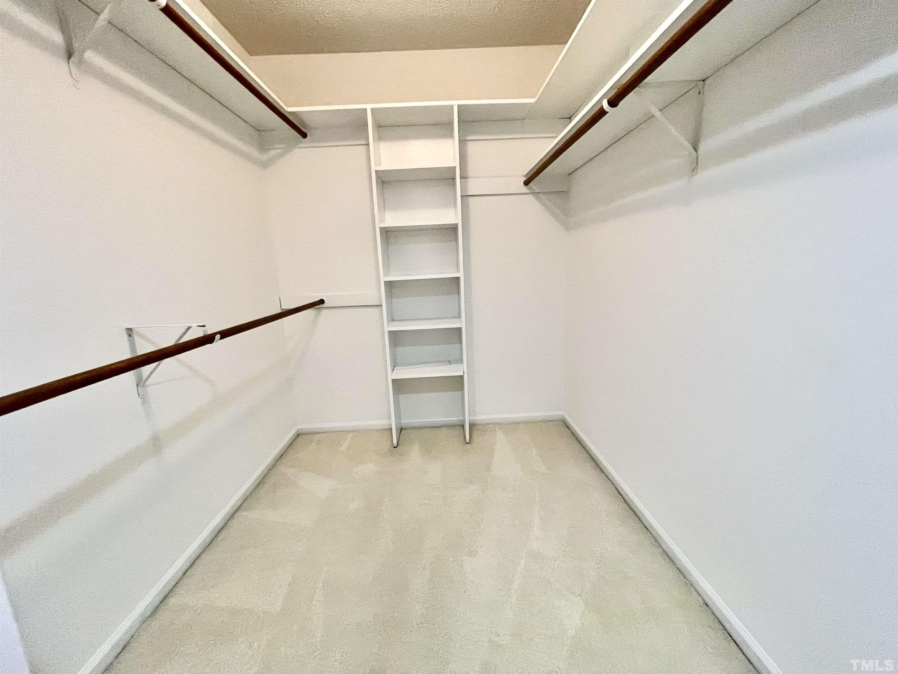 3100 Shadwell Court Raleigh, NC 27613 - Photo 22 of 30 a view of an empty walk in closet