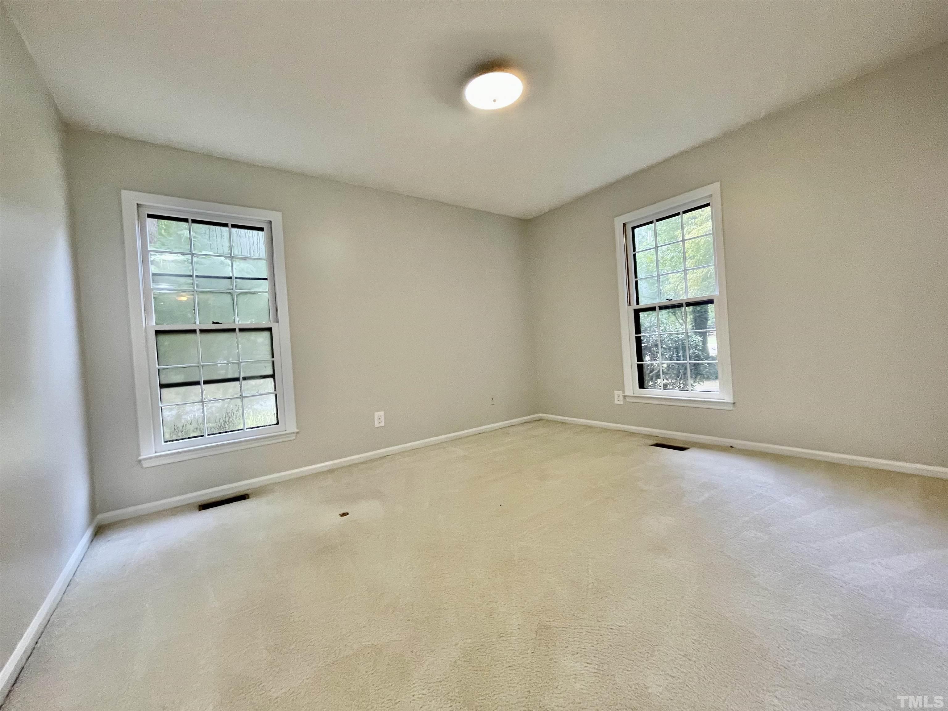 3100 Shadwell Court Raleigh, NC 27613 - Photo 24 of 30 an empty room with a window