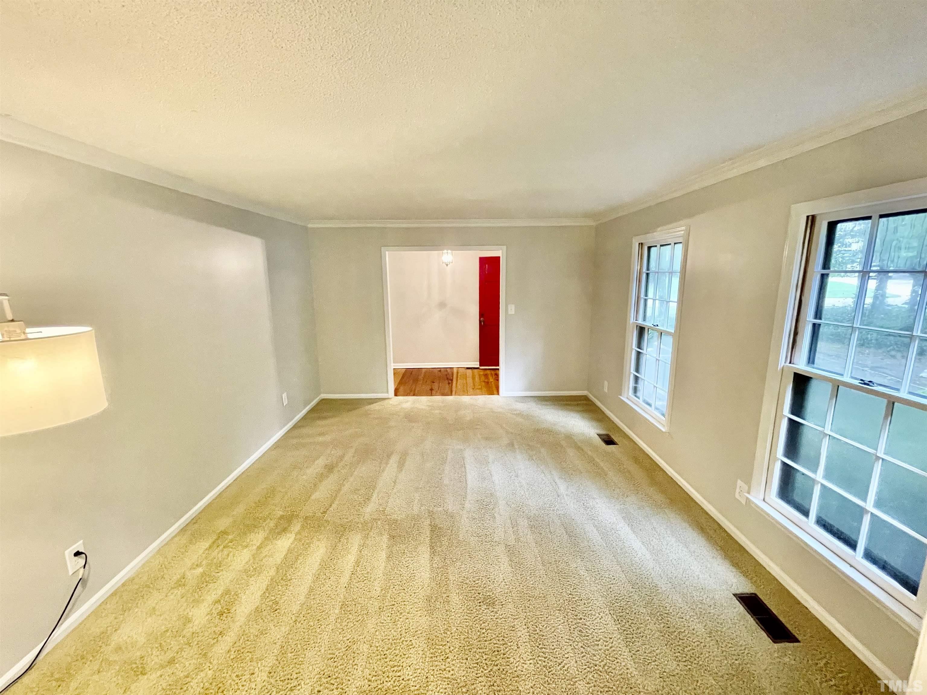 3100 Shadwell Court Raleigh, NC 27613 - Photo 7 of 30 a view of empty room with windows