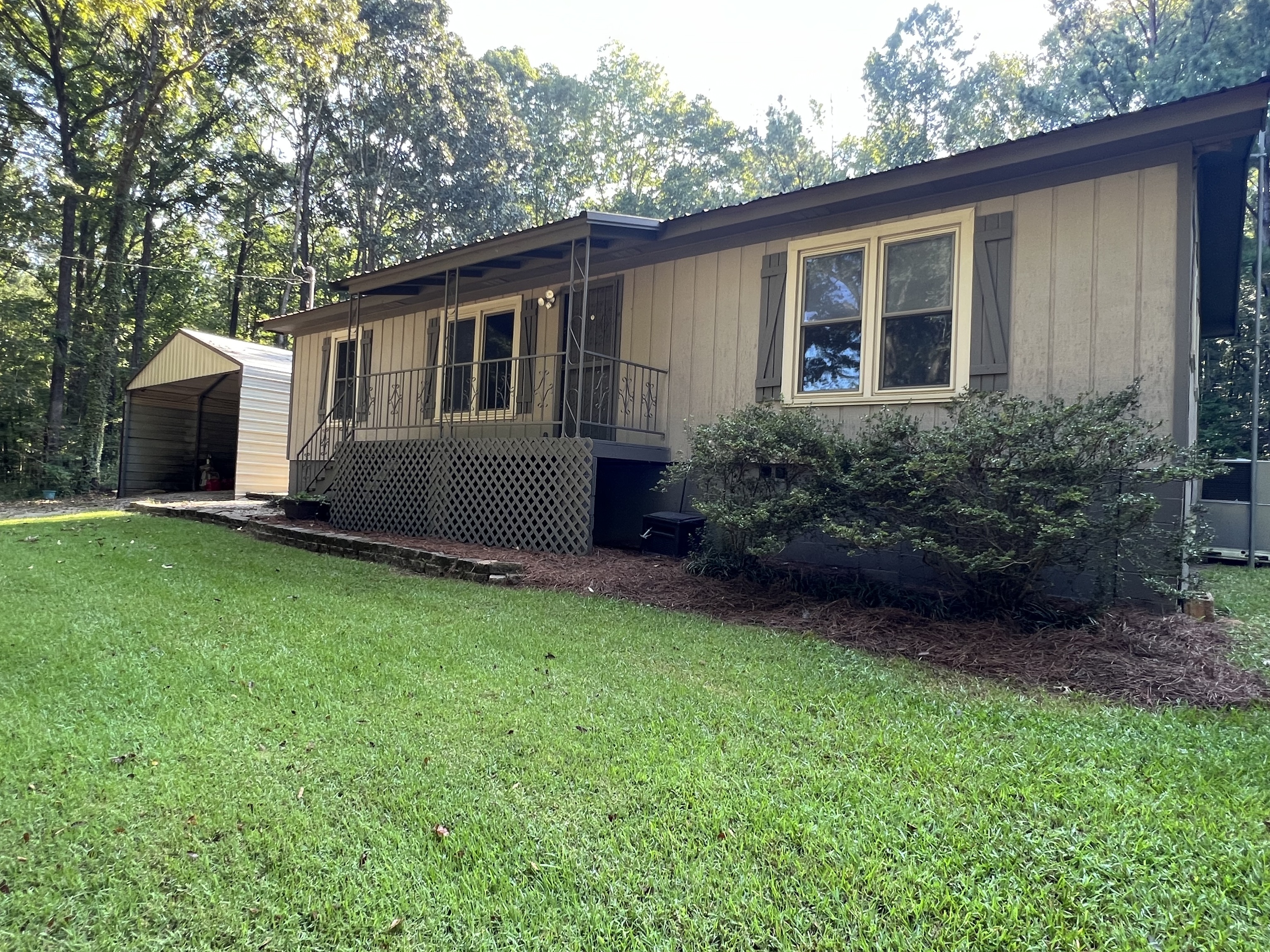 990 Rock Mills Road LaGrange, GA 30240 - Photo 1 of 1 a front view of house with yard and green space