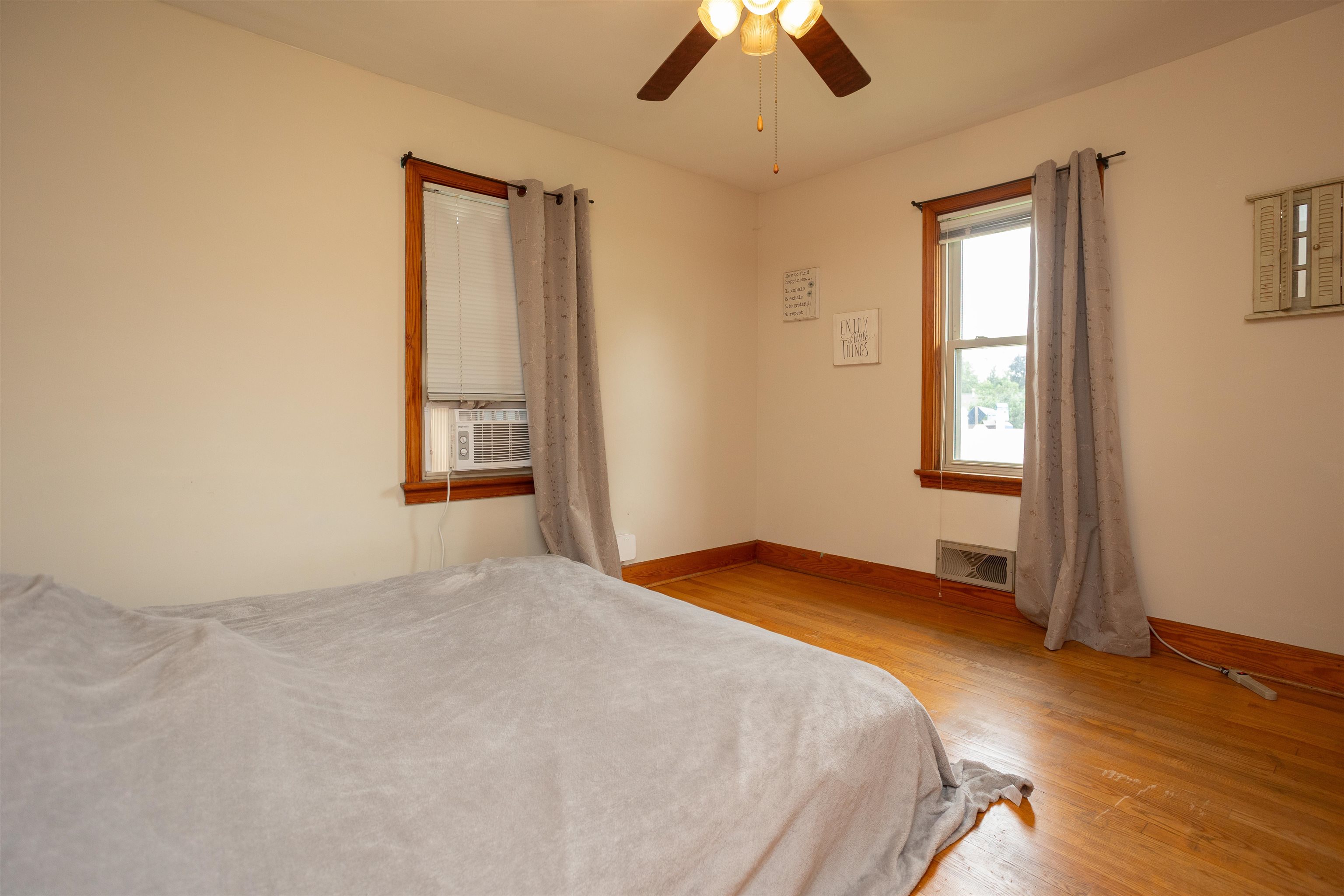 211 George Street Staunton, VA 24401 - Photo 13 of 37 a bedroom with a bed and a window
