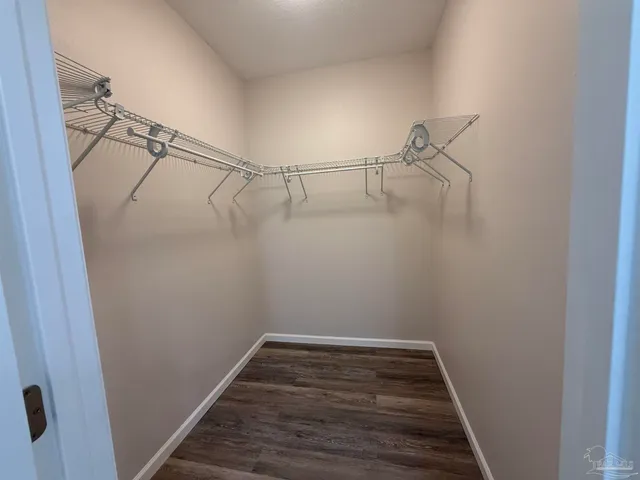 a view of a room with racks on the wall