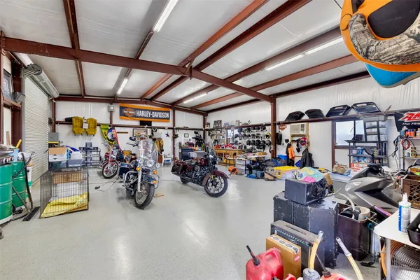 a view of a park with furniture and a small yard