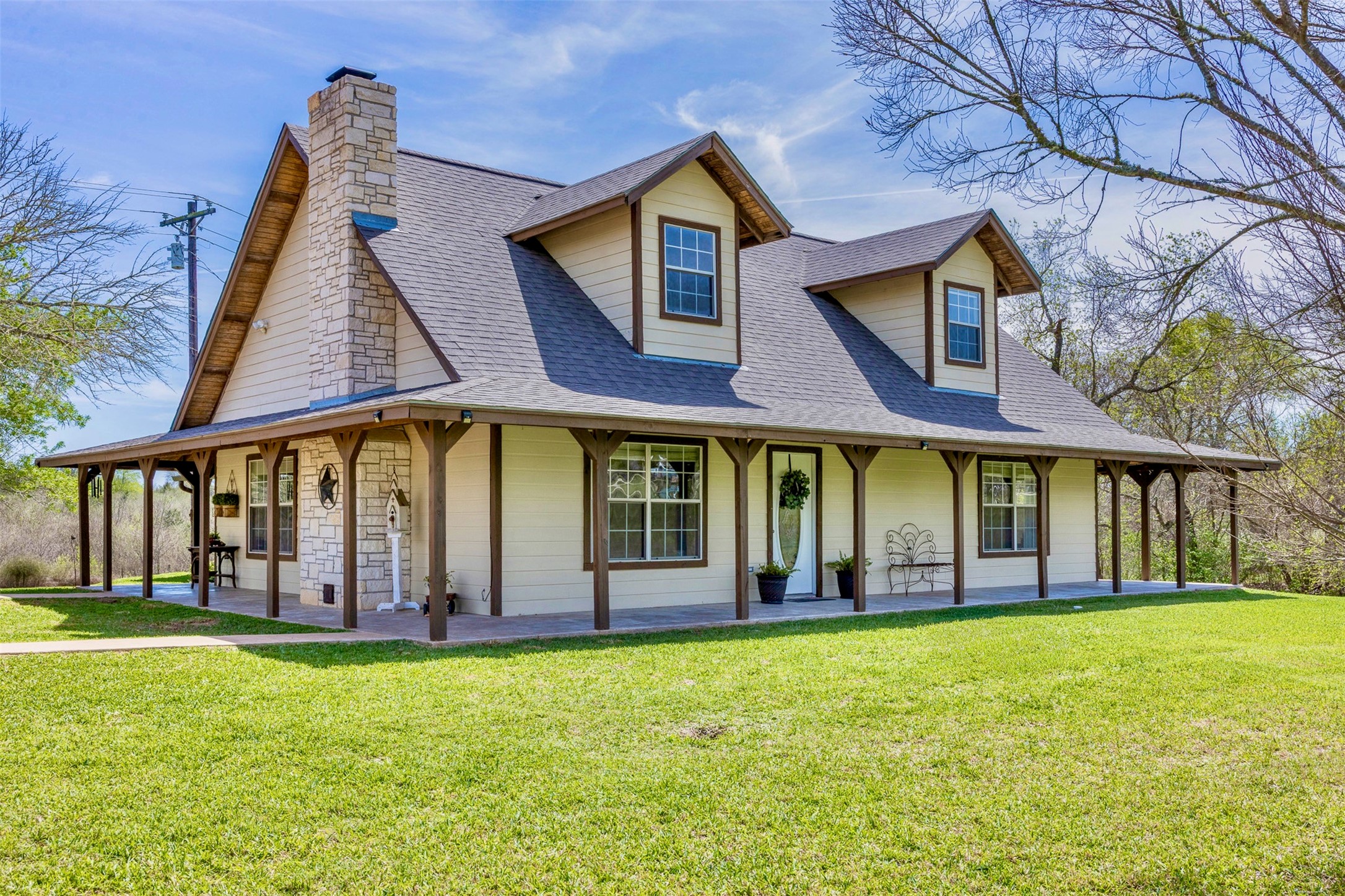999 Salem Road Brenham, TX 77833 - Photo 16 of 40 front view of house with a yard