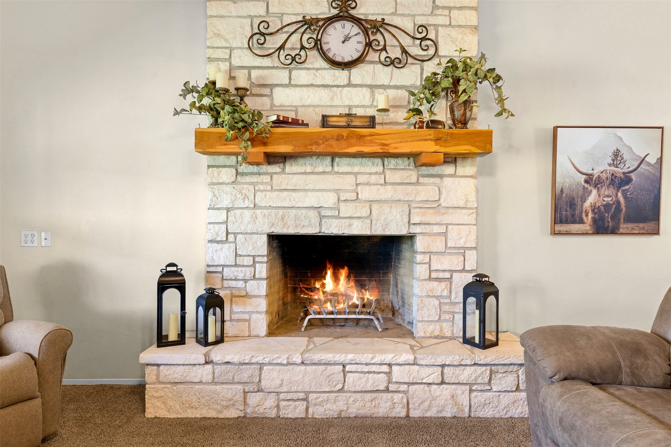 999 Salem Road Brenham, TX 77833 - Photo 19 of 40 a living room with furniture and a fireplace