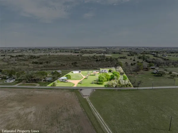 a view of swimming pool with a yard
