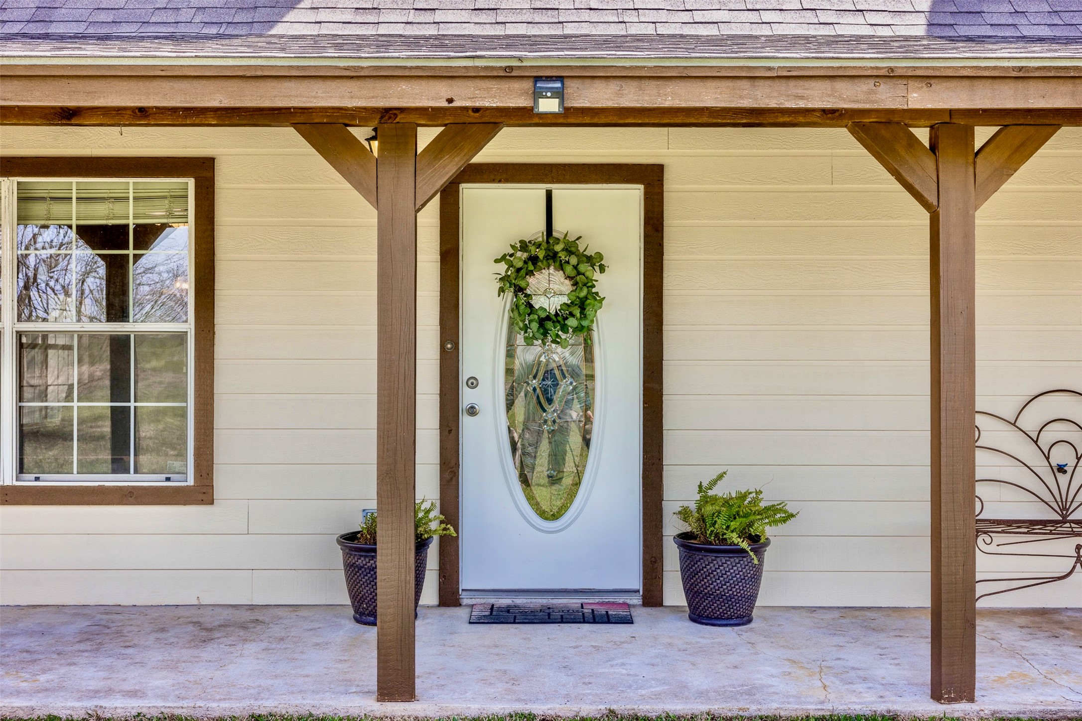 999 Salem Road Brenham, TX 77833 - Photo 6 of 40 a front view of a house with garden