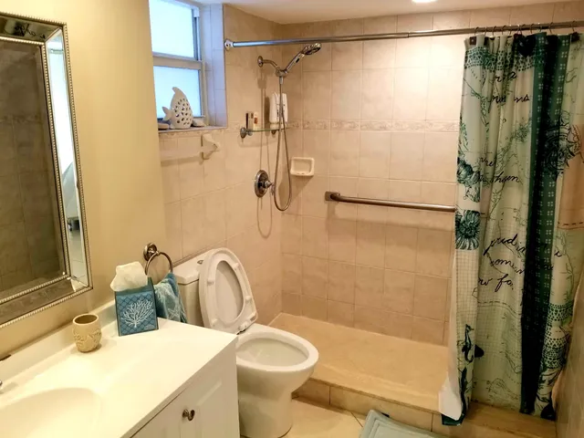 a view of a chairs and table in a room