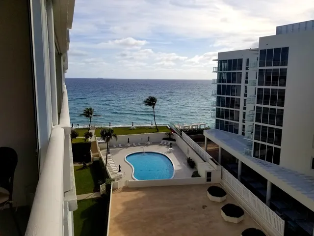 a view of a swimming pool and a buildings
