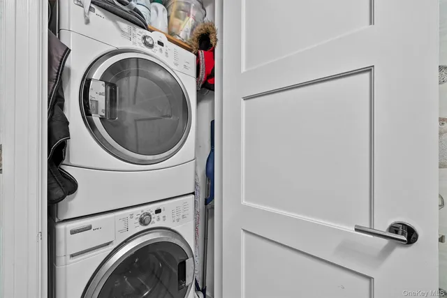 a utility room with dryer and washer