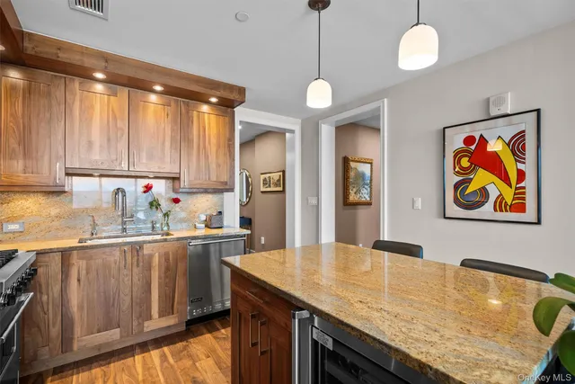 a kitchen with sink cabinets and window