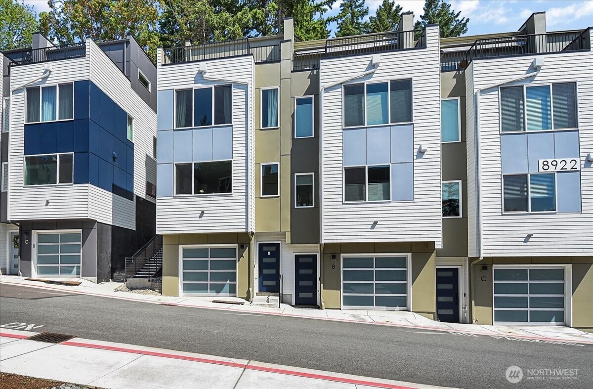 a front view of a building with a parking space