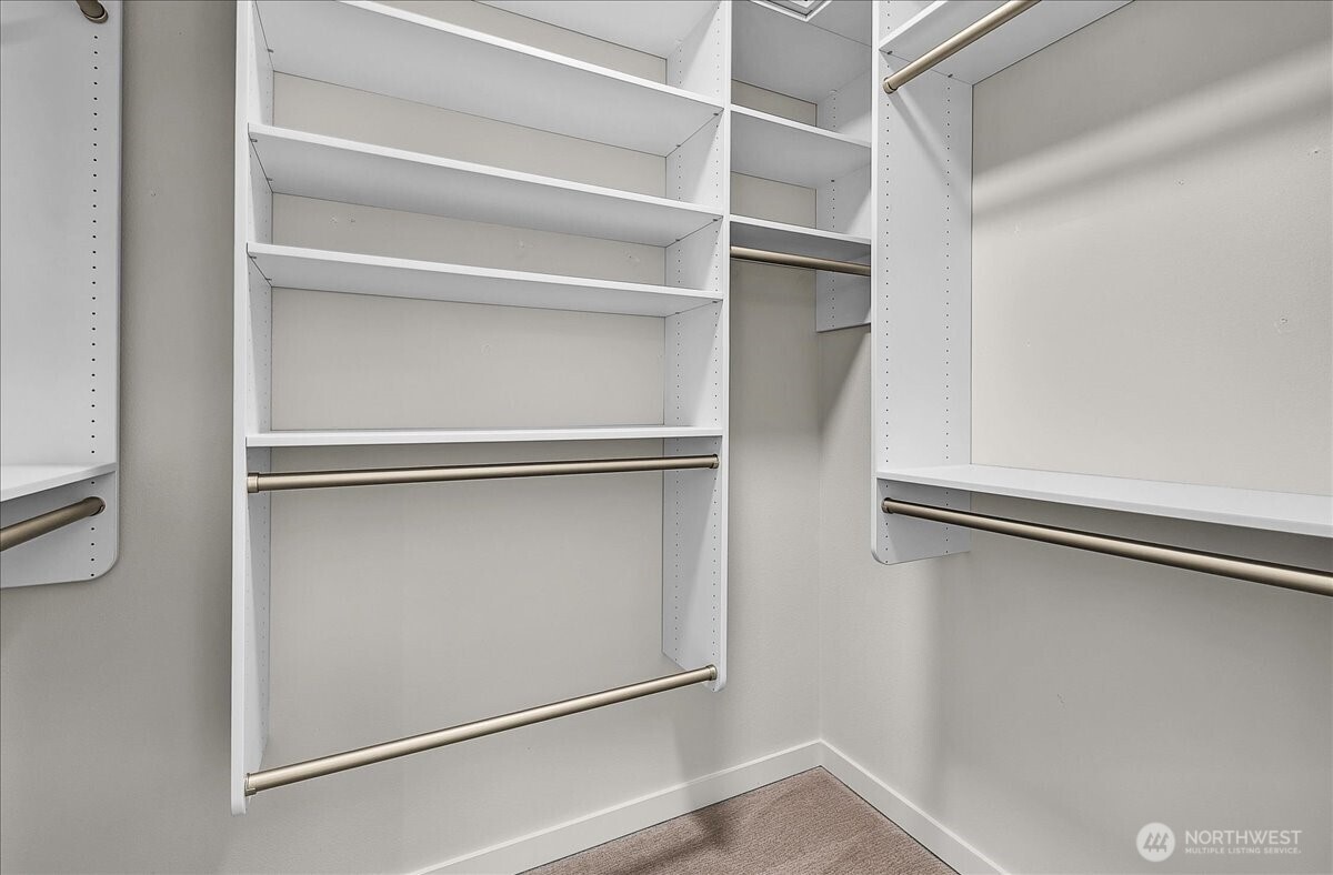 8922 Northeast 173rd Place, Unit A Bothell, WA 98011 - Photo 12 of 26 a view of an empty walk in closet