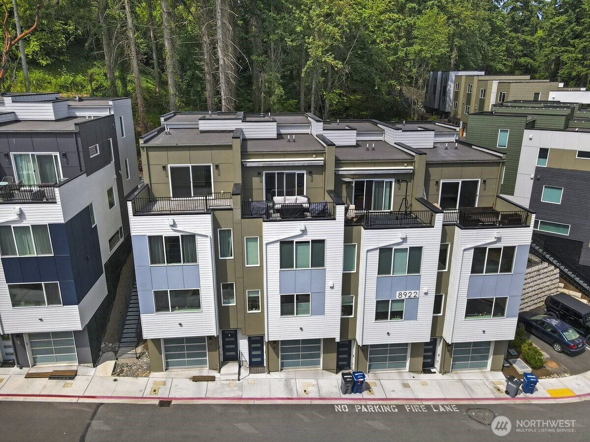 8922 Northeast 173rd Place, Unit A Bothell, WA 98011 - Photo 26 of 26 a front view of a multi story building