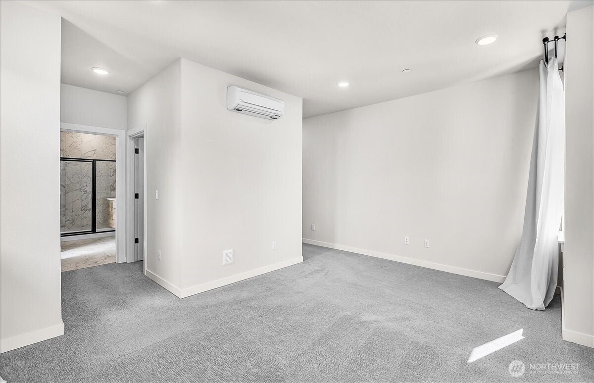 8922 Northeast 173rd Place, Unit A Bothell, WA 98011 - Photo 10 of 26 a view of an empty room