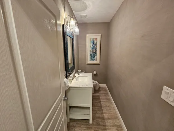 a bathroom with a sink and mirror