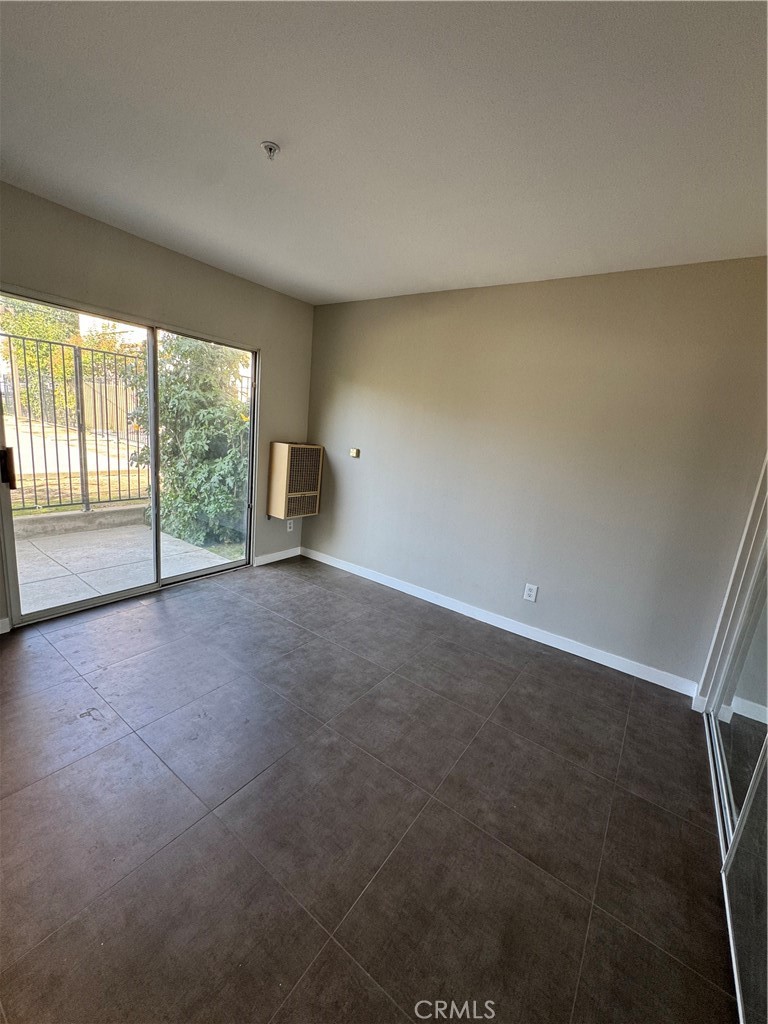 132 North 3rd Street, Unit A Alhambra, CA 91801 - Photo 8 of 15 an empty room with windows
