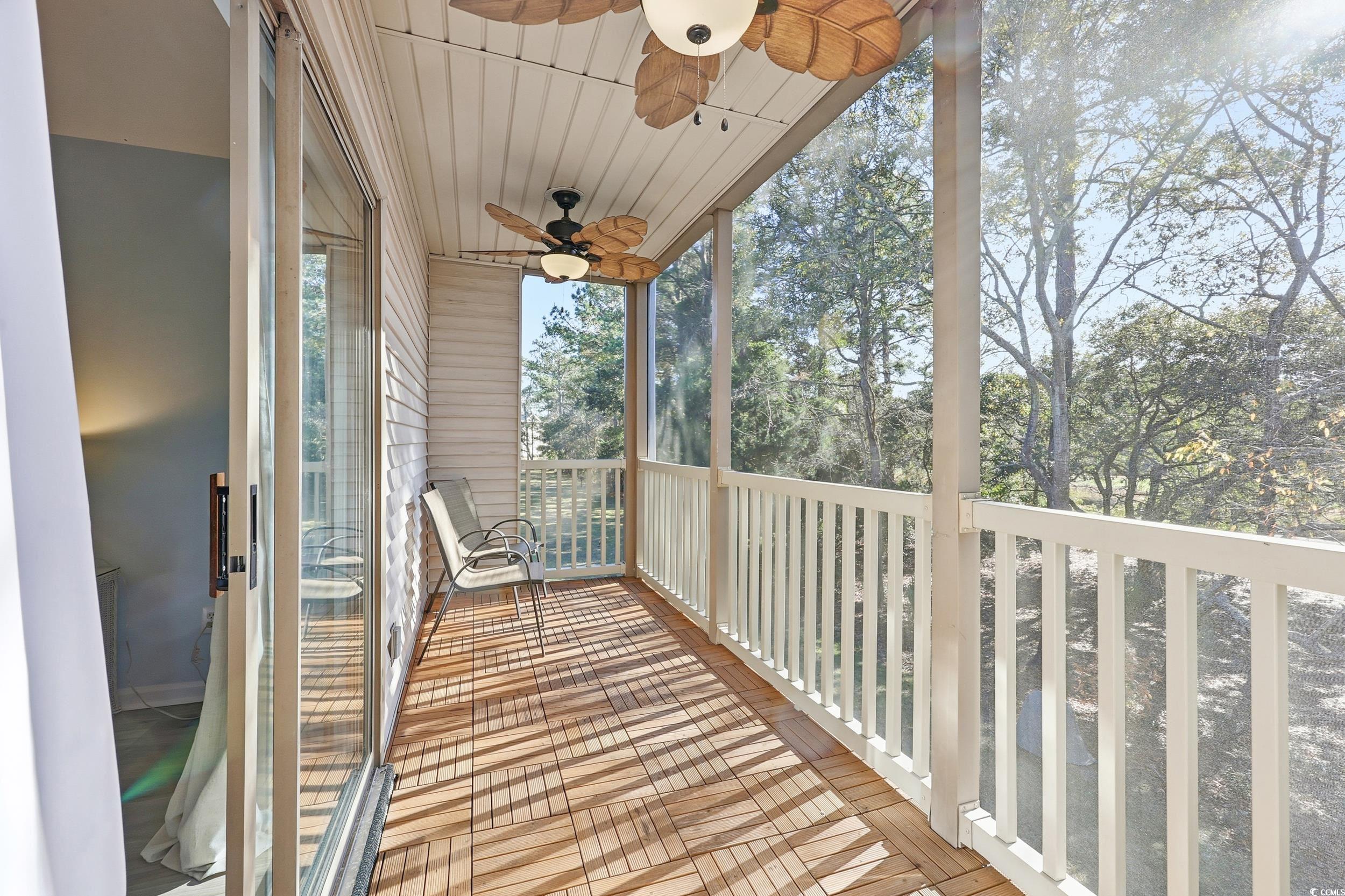 448 Pinehurst Lane, Unit 16F Pawleys Island, SC 29585 - Photo 17 of 31 Balcony with ceiling fan