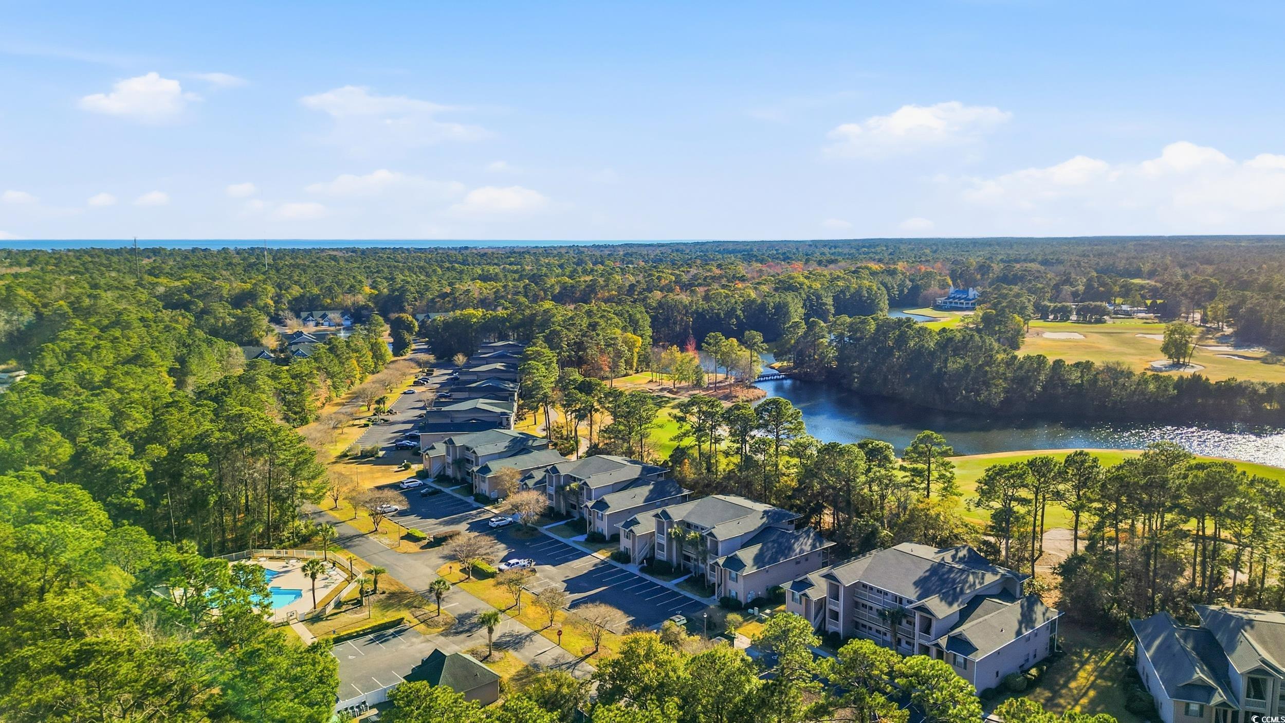 448 Pinehurst Lane, Unit 16F Pawleys Island, SC 29585 - Photo 19 of 31 Aerial overview of property's location featuring a nearby body of water and nearby suburban area