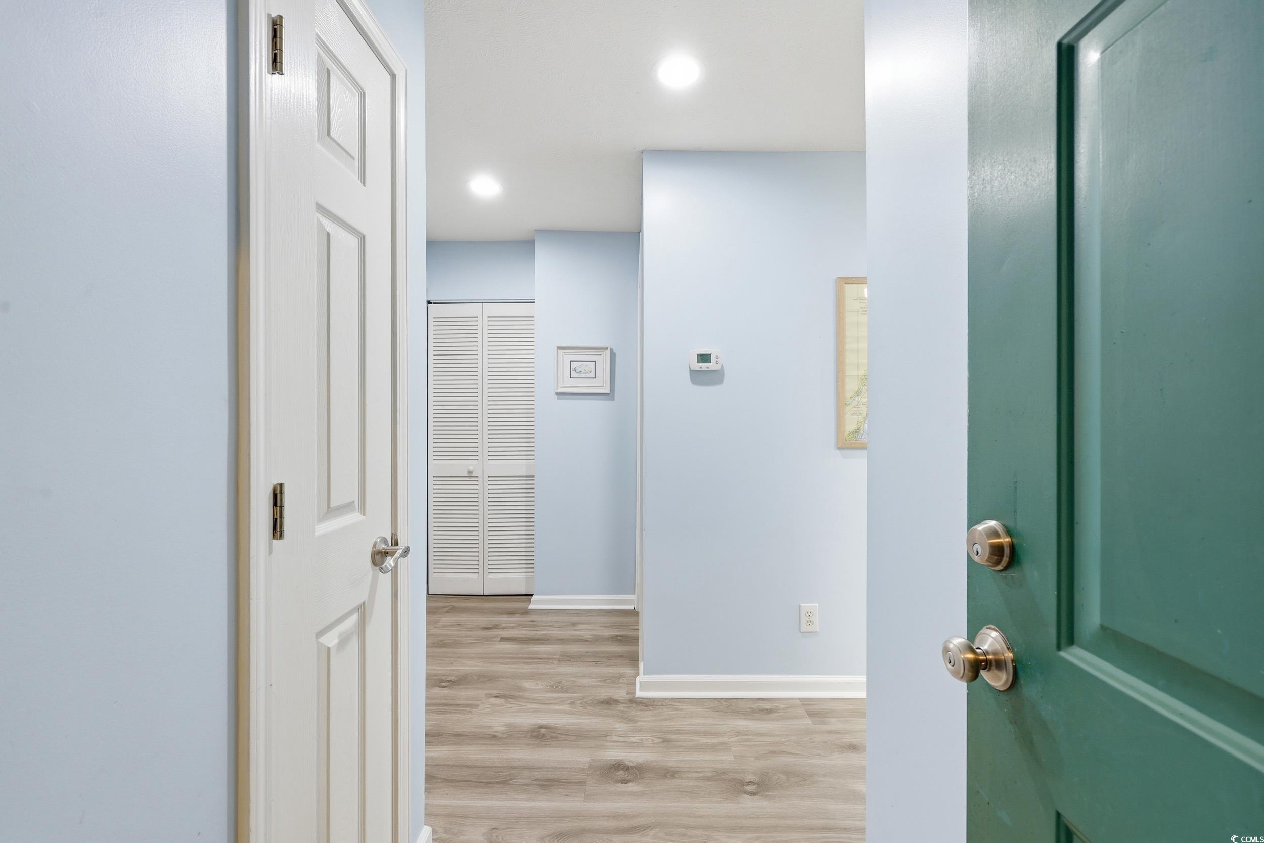 448 Pinehurst Lane, Unit 16F Pawleys Island, SC 29585 - Photo 5 of 31 Hall featuring light wood finished floors and recessed lighting