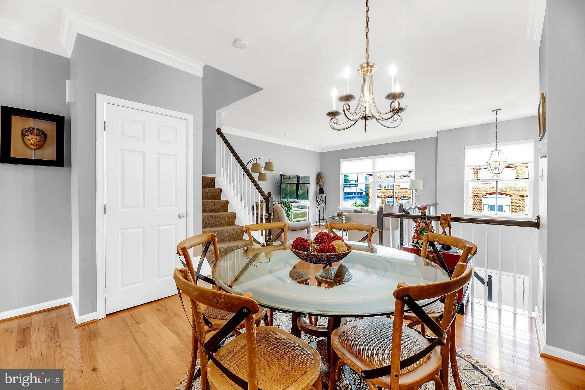 2090 Clipper Park Road Baltimore, MD 21211 - Photo 1 of 75 a view of a dining room with furniture and wooden floor