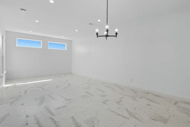 a view of a kitchen with a sink