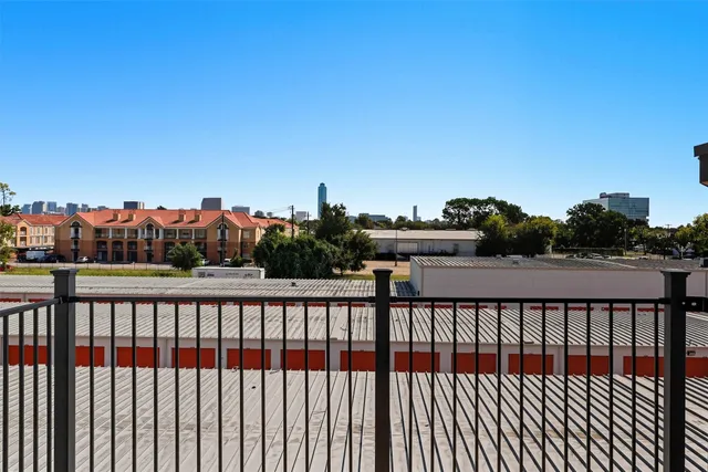 a view of backyard with potted plants