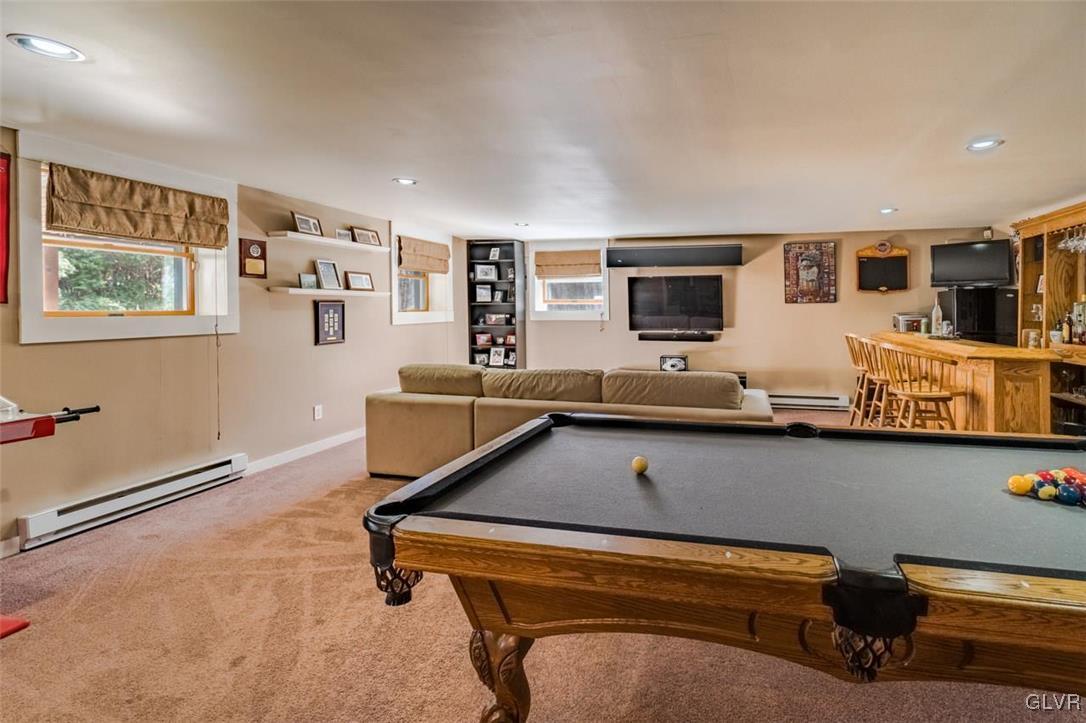 273 Chestnut Hill Road Emmaus, PA 18049 - Photo 15 of 28 Lower Level--Spacious Game Room with bar and outsi