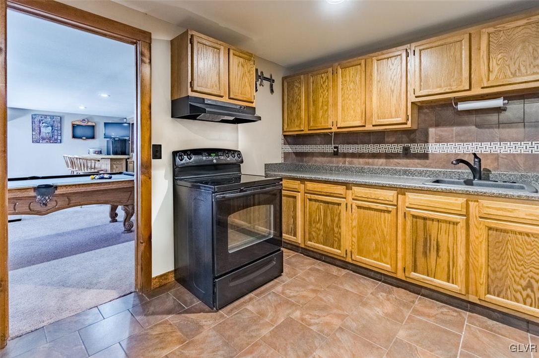 273 Chestnut Hill Road Emmaus, PA 18049 - Photo 17 of 28 Lower Level--full kitchen in the center of game ro
