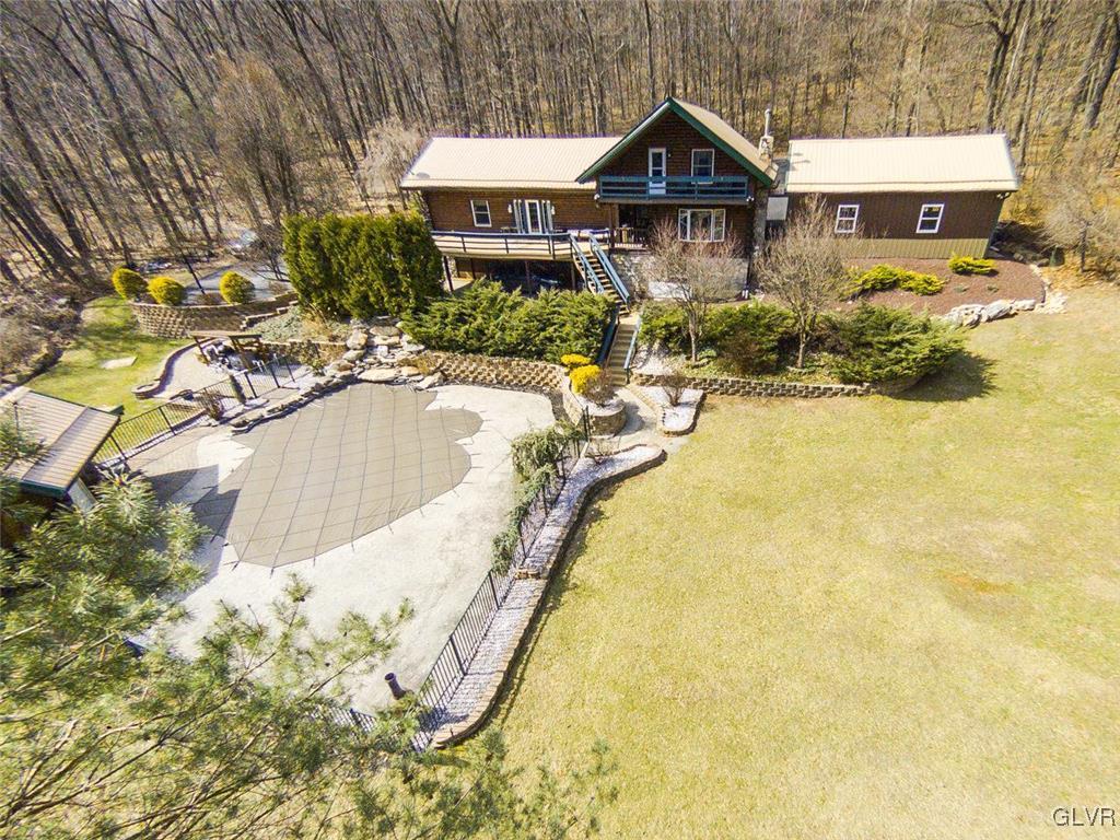 273 Chestnut Hill Road Emmaus, PA 18049 - Photo 23 of 28 View of home and pool from backyard