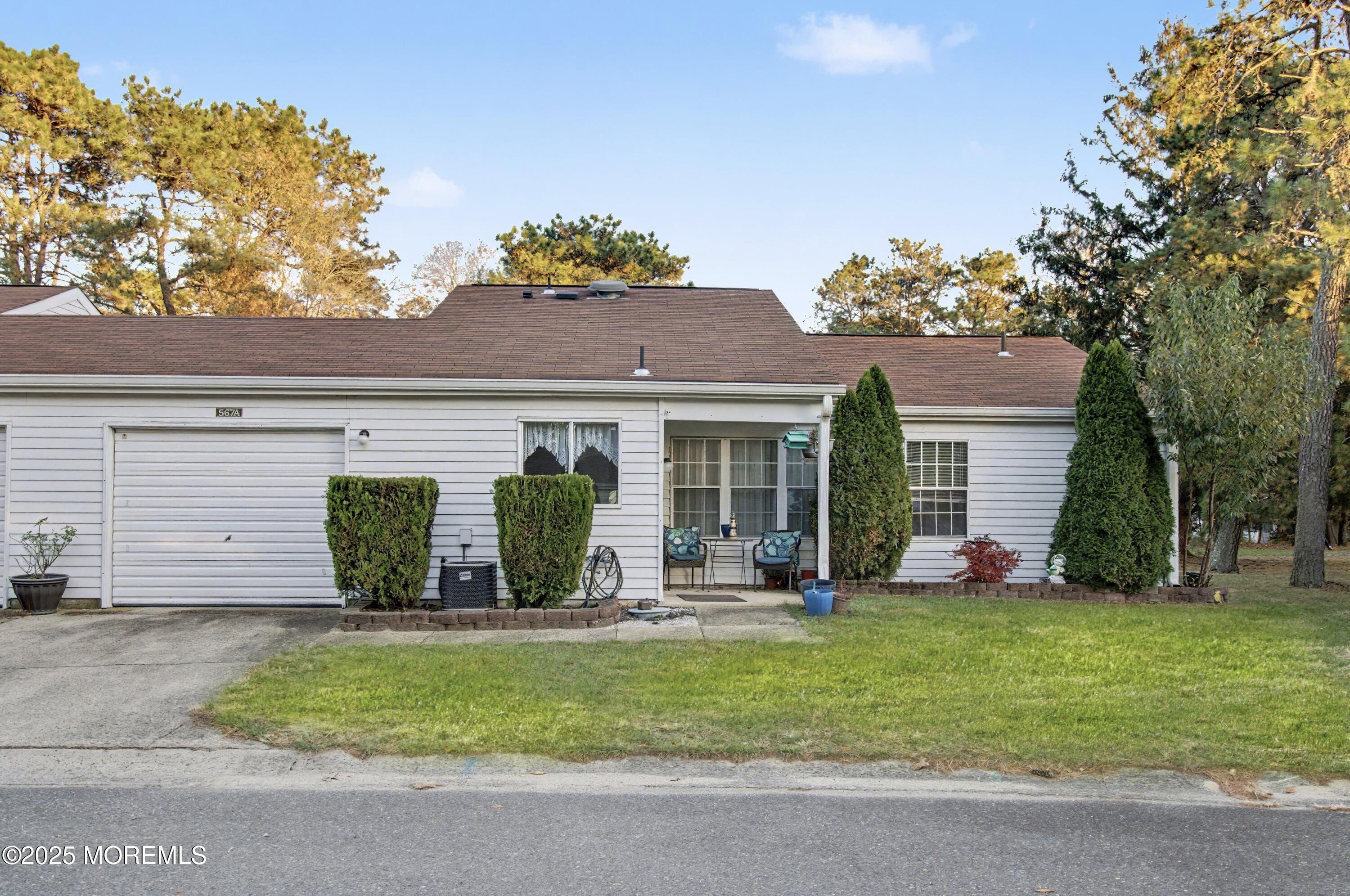 567 A Mayfair Road Manchester Township, NJ 08759 - Photo 2 of 46 front view of a house with a yard