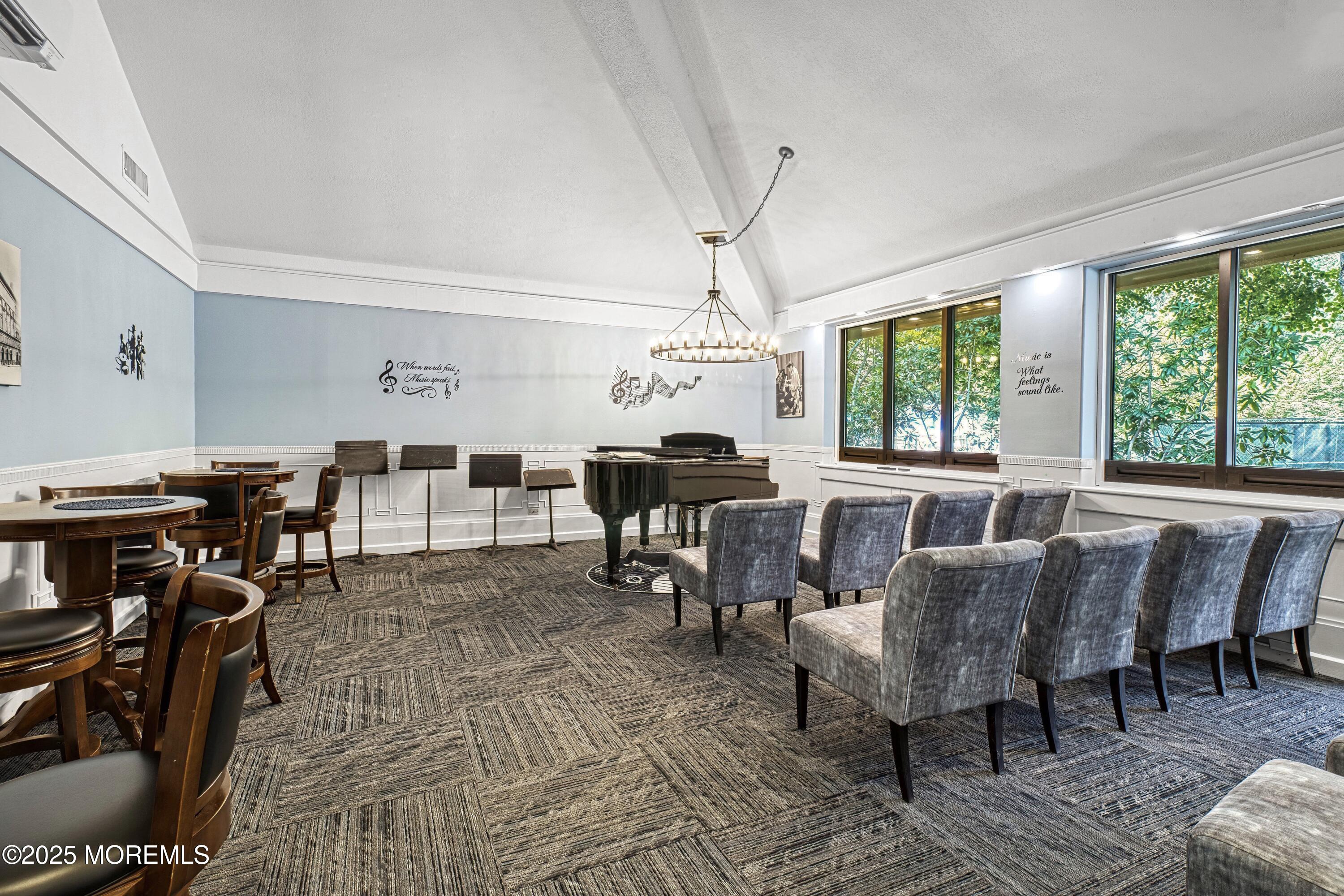 567 A Mayfair Road Manchester Township, NJ 08759 - Photo 33 of 46 a living room with furniture and a chandelier