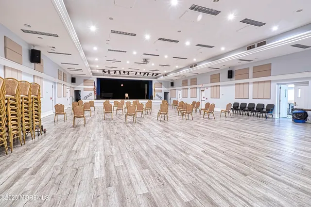 a view of a playground with basketball court
