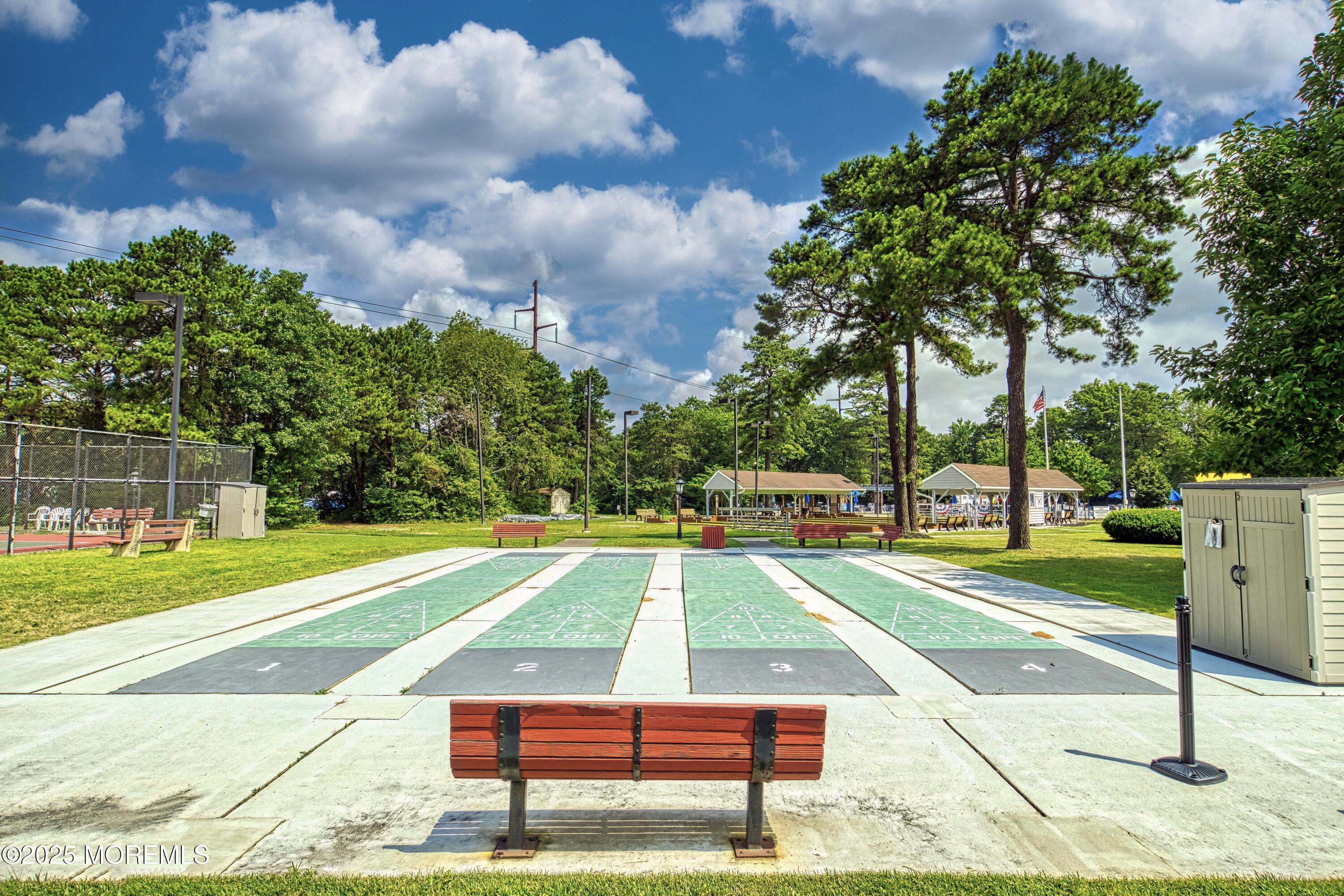 567 A Mayfair Road Manchester Township, NJ 08759 - Photo 39 of 46 a small yard with palm trees