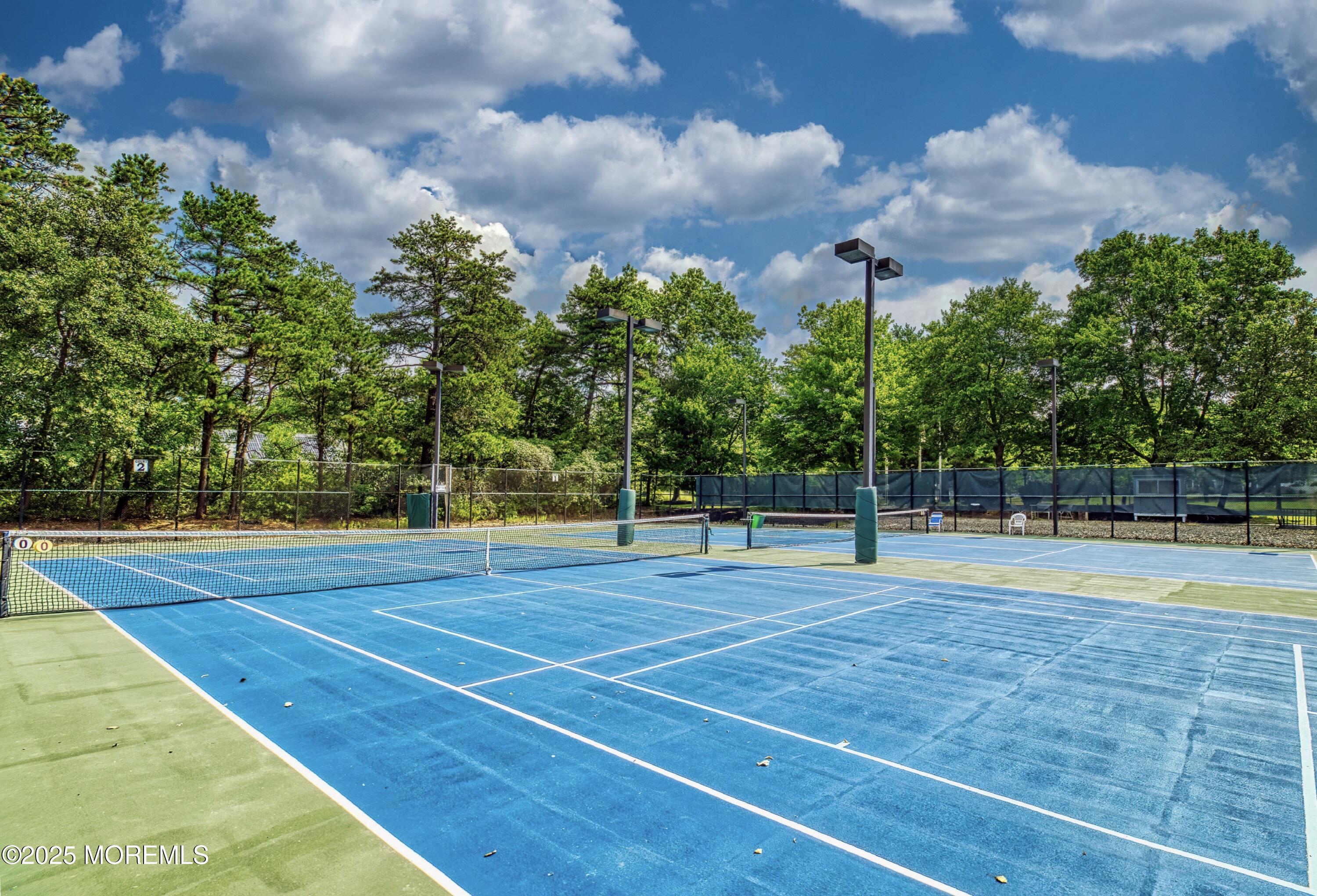 567 A Mayfair Road Manchester Township, NJ 08759 - Photo 42 of 46 a view of a tennis court